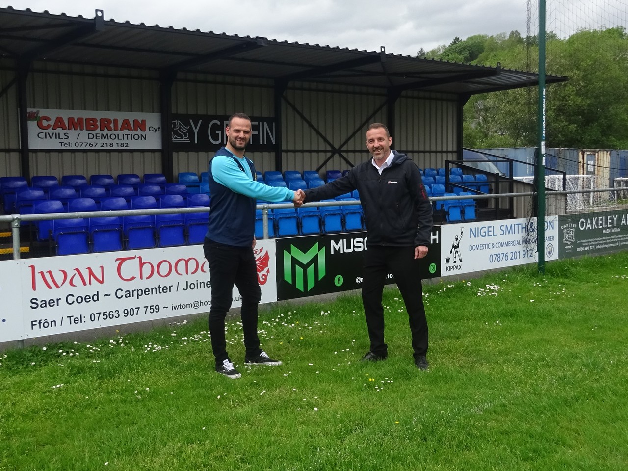 Penrhyndeudraeth FC committee member Barry Evans with Steve Ellison, National Grid's senior project manager for its Snowdonia VIP project