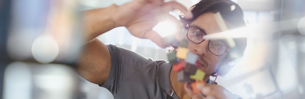 A researcher examining his work