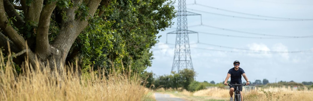 Man cycling near Bicker Fen