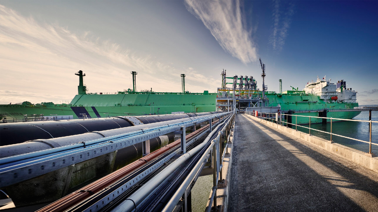 Ship docked at the end of the jetty at the Grain LNG terminal in Kent