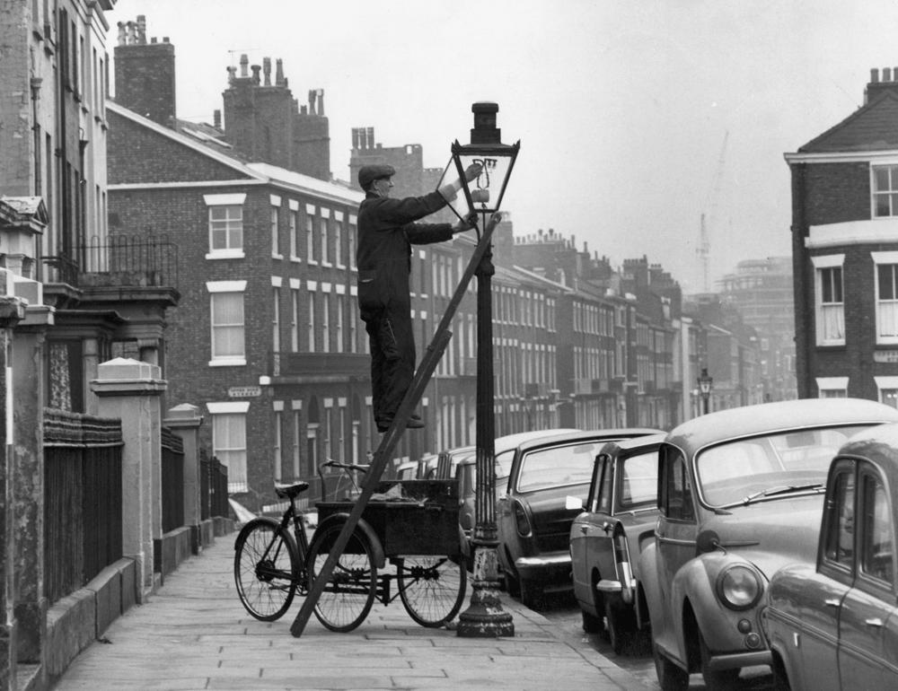 Archive2_LampLighter_1000x770.jpg Lamp trimmer from Liverpool in 1968 - archive picture used in the National Grid story 'Time travelling through the history of energy at the National Grid archive'