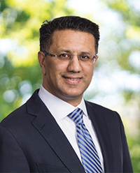 Portrait photo of President of National Grid US Badar Khan for climate change challenge story