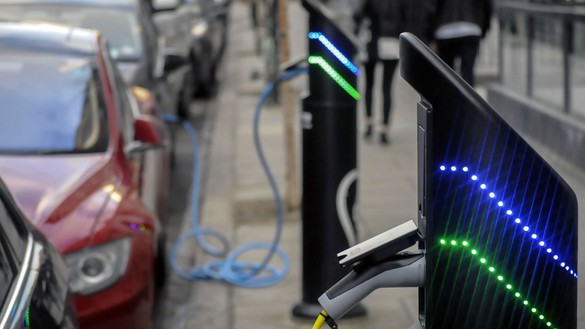 Electric car charging in street for National Grid article