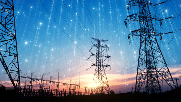 Electricity pylons against sunset for National Grid Partners investing in SparkCognition