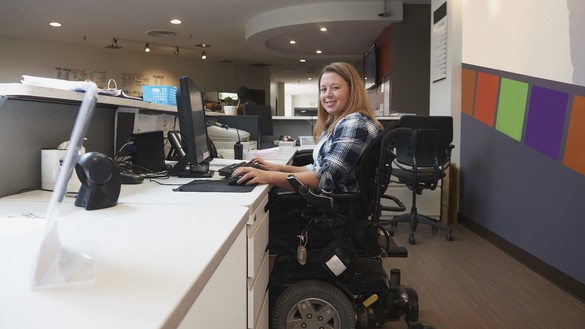 Young woman in wheelchair for National Grid article on disability
